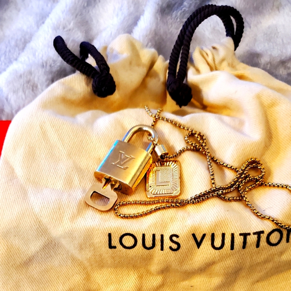 Authenic Louis Vuitton Padlock & Key